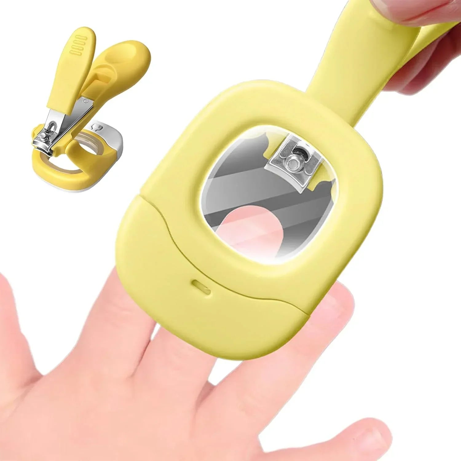 Yellow nail clippers with magnifying glass trimming fingernails on a child's hand