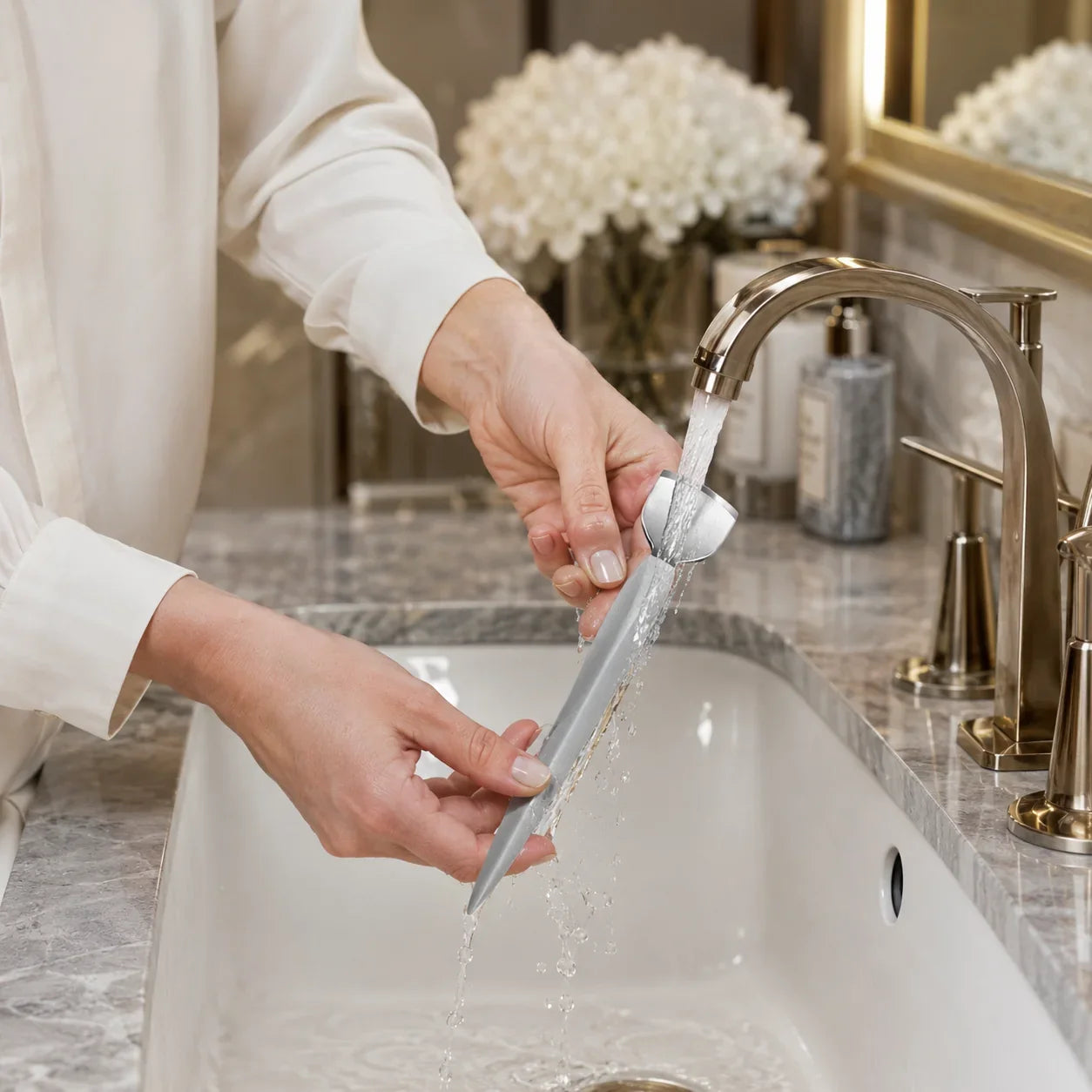 DRMODE pedicure knife set being cleaned under running water, showcasing easy-to-clean medical grade stainless steel construction for hygienic professional foot care